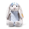 Steiff Hoppie Rabbit in Ski Outfit, 12 inches, sits upright with long floppy ears, soft light grey fur, and a light blue body. It wears a shiny silver sleep mask and a yellow tag on its left ear against a white background.
