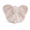 Introducing the Bukowski - August Elephant: a soft, plush toy featuring large floppy ears and a small tail, all crafted in light beige fur. Viewed from behind, this huggable elephant is the perfect bedtime companion for cozy snuggles.