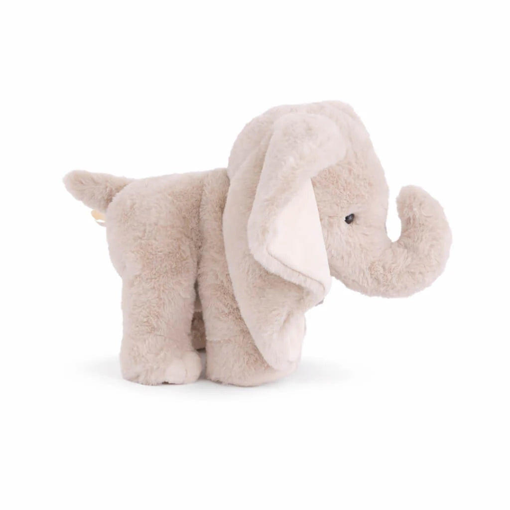 The Bukowski - August Elephant is a soft plush toy featuring light grey fur, large floppy ears, a short tail, and an upturned trunk. Standing on all four legs, this gentle and cuddly bedtime snuggle plush is perfect for comforting hugs.