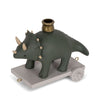 A whimsical gray Dinosaur Birthday Train With Beeswax Candles candle holder on wheels, featuring golden accents and a candle socket on its back, highlighted by interchangeable numbers, set against a plain white background.