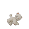 The Olli Ella Binky Kitten Kiki - White is a soft, white plush cat with a smiling face, closed eyes, pink details, and a curved tail—perfect for cuddling and snuggling. Shown against a plain white background.