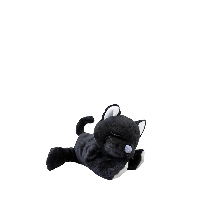 The Olli Ella Binky Kitten Koko - Black is a small plush cat toy with closed eyes, lying on its side with one paw out, as if sleeping. Its cuddly design and soft black fur look extra cozy against the plain white background.