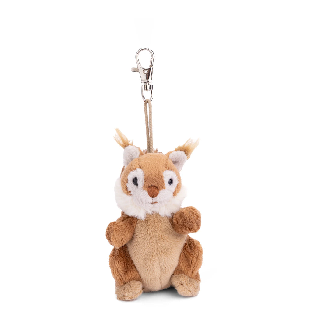 The Bukowski - Brunis Squirrel Bag Charm features plush brown and white fur, a sweet upright pose with small arms, white cheeks, and tufted ears. Attached to a silver keyring clip on a plain white background, this charming woodland accessory makes the perfect cute keychain or bag charm for any fan of forest friends.