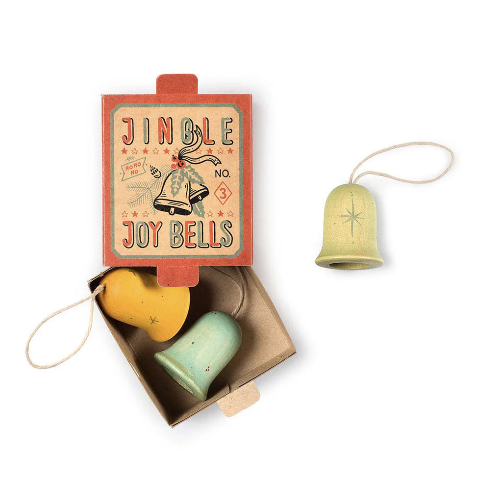 The Grapat Ornament Set - Jingle Joy Bells includes three hand-painted yellow, aqua, and green ornaments with strings in a retro box. One bell is outside the box, ready to add charm to your holiday decor.