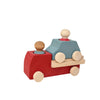 The Lubulona Wooden Tow Truck - Red is a natural wood toy with a red finish and a removable wooden driver, ideal for small-world play. It features smooth wooden wheels and comes displayed on a white background.