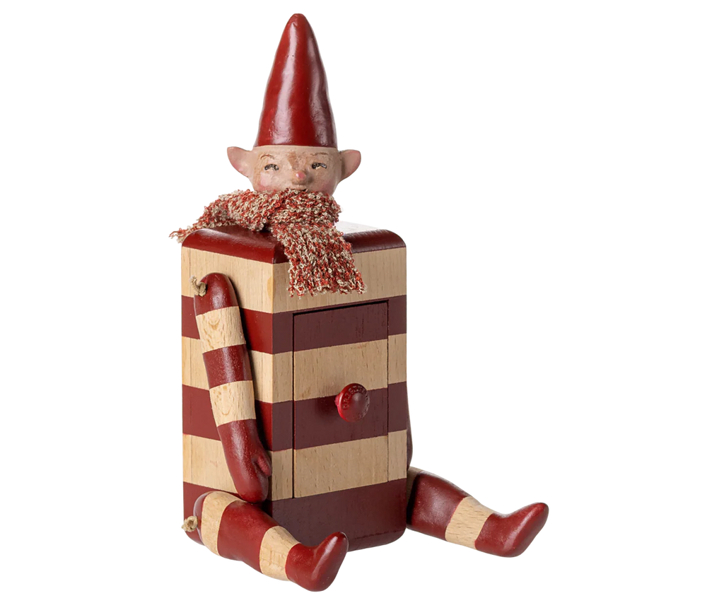 PRE-ORDER: Maileg Elf with Drawer - Red features a charming elf collectible with red hat, scarf, and striped body—perfect as an enchanting decoration. Estimated arrival mid August.