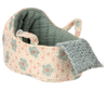 The PRE-ORDER: Carry Cot, Baby Mouse Size - Blue is a small fabric cot with a soft interior, two handles, and a gray knitted flap. Designed for baby mice, it’s portable and cozy. Estimated ship date: late November.