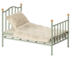 The Maileg Vintage Single Bed, Mouse - Mint features a pale green finish with gold-trimmed bedposts and cream floral bedding—ideal as a charming mice bed.