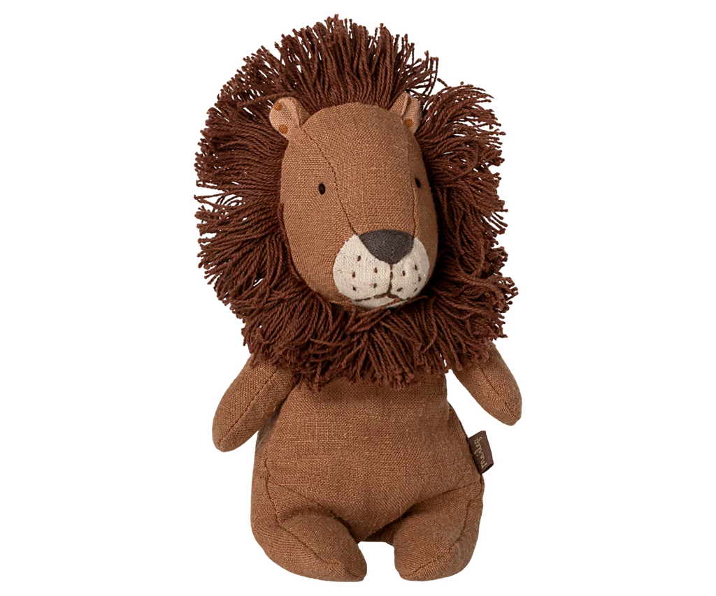 The Maileg Lion, Mini is a soft plush toy with a thick shaggy mane, small round ears, and stitched features. Sitting upright against a white background, it's an adorable addition to your safari friends collection.