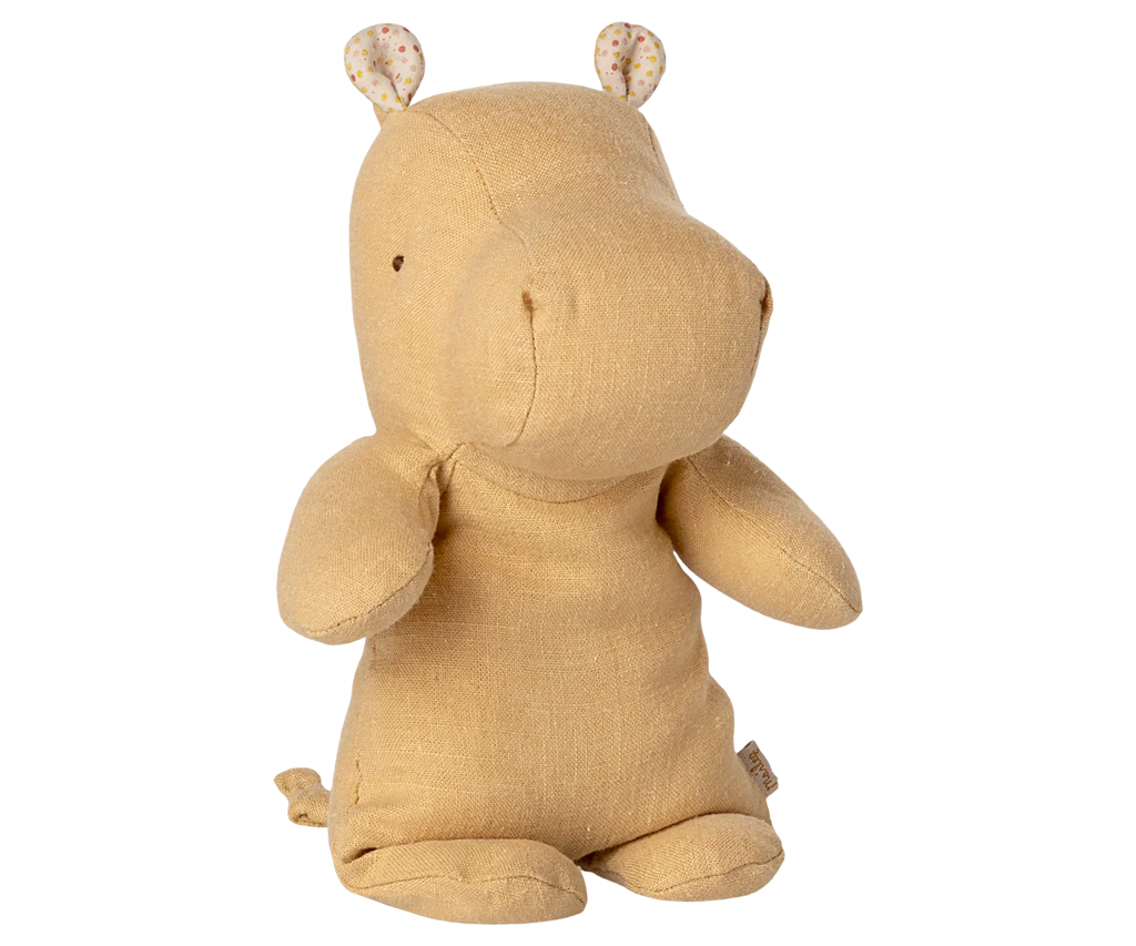 A Maileg Hippo, Small - Cream Yellow from the Safari Friends collection, made with gentle soft fabric and featuring small dotted ears, sits upright against a plain white background.