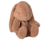 The Maileg Plush Bunny, Medium - Vintage Rose features long floppy ears, a round body, and a small bow around its neck. Sitting upright against a white background, this soft toy is perfect for cuddling and comfort.