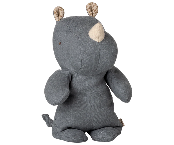 The Maileg Rhino, Small – Dusty Blue, is a charming stuffed rhino toy in soft blue fabric with beige horns and ear linings, sitting upright on a plain white background—an adorable Safari companion for all ages.