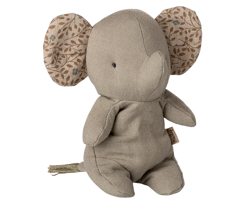 Meet the Maileg Elephant, Mini - Iron Grey: a soft plush from our Safari Friends collection. It sits upright with simple stitched features, large patterned ears with a brown leaf motif, and a short tail, all in classic iron grey.