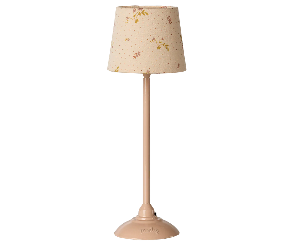 The Maileg Floor Lamp, Miniature - Powder, features a slender base and a floral fabric lampshade—perfect as a charming dollhouse lamp or Maileg accessory.