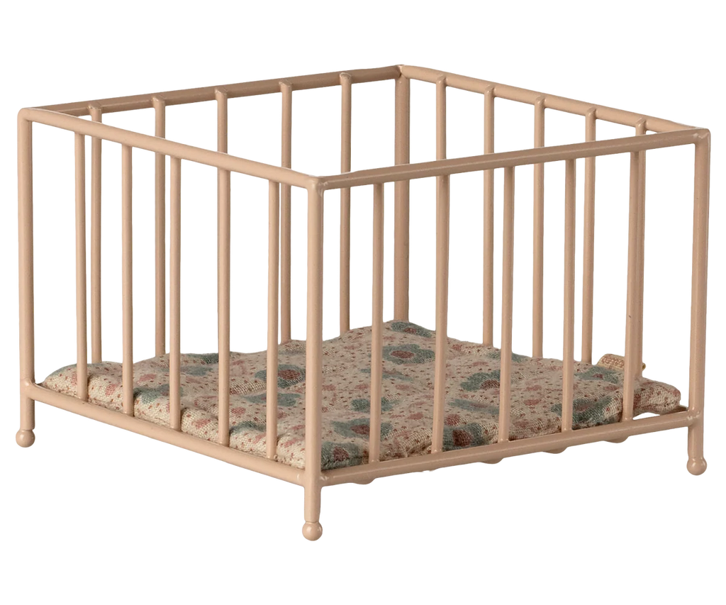 The Maileg Playpen, My - Rose is a small, square beige playpen with thin bars and a floral padded mattress—ideal for your baby mouse to rest and play. Expected arrival: 02/15/26.