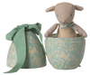 The Maileg Easter Egg with Micro Lamb, Small - Dusty Mint features a soft lamb inside a blue and cream egg-shaped box with playful animal and plant patterns—a delightful gift for children. Expected arrival by 02/15/26.