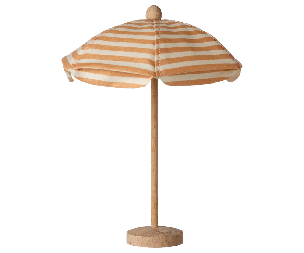 The Maileg Beach Umbrella, Mouse – Soft Coral (expected arrival 03/15/26) features a small wooden base and striped canopy, ideal for pretend play or adding a cozy beach spot to your Maileg mouse family’s scene.