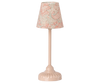 The Maileg Vintage Floor Lamp, Mouse - Powder features a beige base and a drum lampshade with a light blue and red floral design, making it a charming addition to any toy room decor.