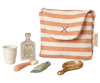 The Maileg Toothbrush Set in Bag, Mouse - Coral Stripe (arriving 04/15/26) features a striped toiletry bag with a white cup, pink perfume bottle, tiny brush, cream tube, and gold hand mirror—great for mouse family or bedtime play.