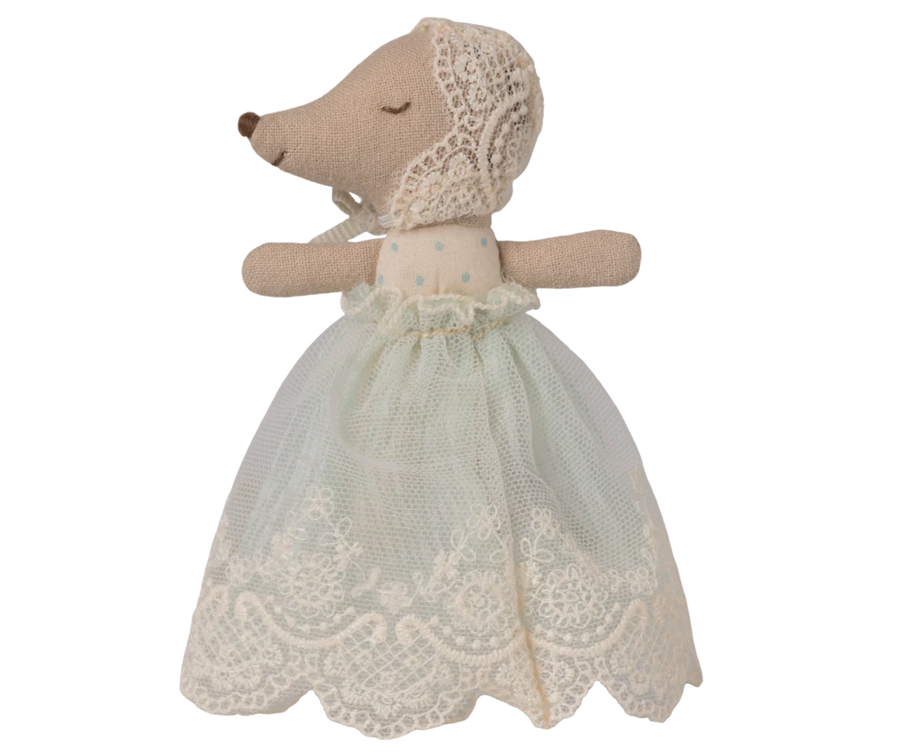 The Maileg Baby Mouse in Gown - Mint, wearing a lace bonnet and a white, lace-trimmed dress, is the perfect addition to any baby mouse collection. Expected arrival by 06/15/26.