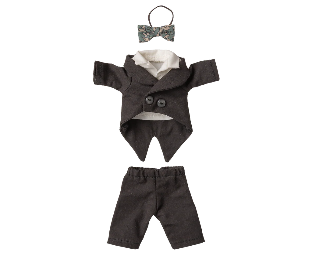 The Maileg Wedding Suit for Dad Mouse (expected 06/15/26) includes a miniature black tuxedo with white shirt, black pants and jacket, plus a teal and white patterned bow tie, all displayed flat on a white background.