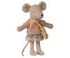 The Maileg Little Sister Mouse with Bag, wearing a striped orange top, plaid skirt, and yellow cheese bag, stands upright with arms outstretched against a white background. Expected arrival by 06/15/26.