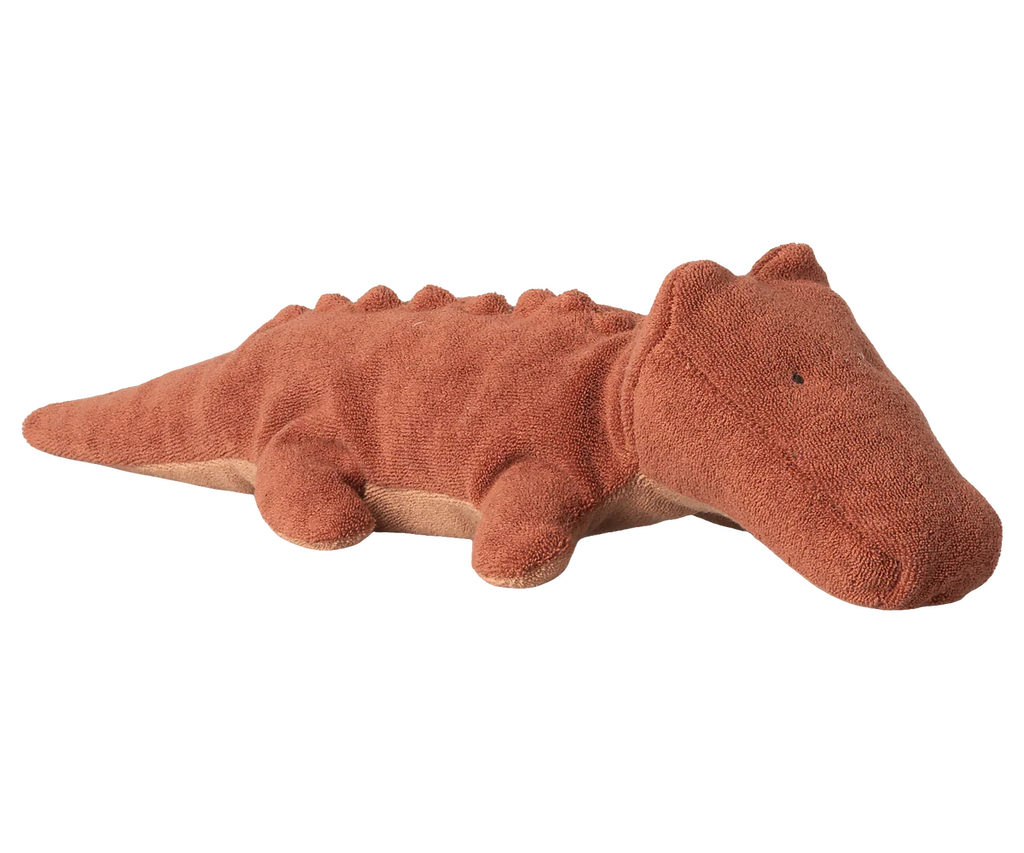 Maileg Crocodile, Small - Vintage Rose is a soft, plush toy crafted from rust-colored textured fabric with minimal facial features—ideal as a huggable stuffed animal for fans of unique soft toys. Expected arrival: 06/15/26.