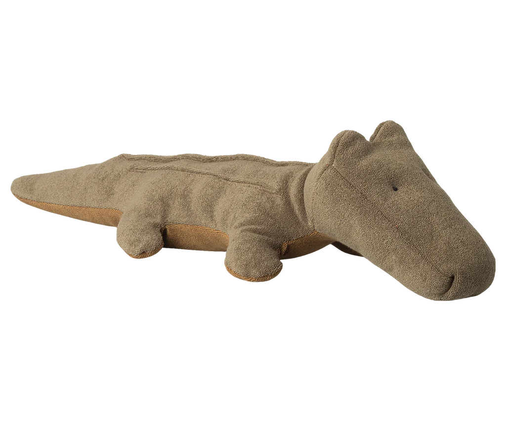 The Maileg Crocodile, Medium - Olive Green is a huggable, minimalist plush toy in a muted olive hue, lying flat on its belly—ideal for soft toy lovers and cozy cuddles.