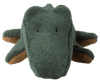 The Maileg Crocodile, Mini - Forest Green is a huggable plush toy shaped like a crocodile, with small black stitched eyes and brown leg accents. Expected arrival: 06/15/26.