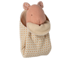 The Maileg Lullaby Friends, Pig, Mini - Rose is a soft pink plush pig with stitched features, wrapped in a cream and orange polka-dot cuddle cloth with fleece lining—perfect as a cozy newborn gift.