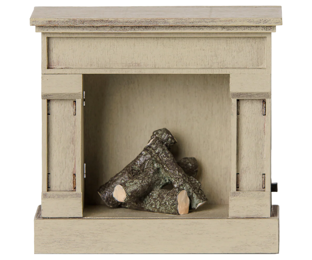 The PRE-ORDER: Maileg Fireplace, Mouse - Off White (arriving mid August) is a small, lightweight wooden fireplace with a vintage finish and decorative logs—ideal for dollhouses or any miniature home display.