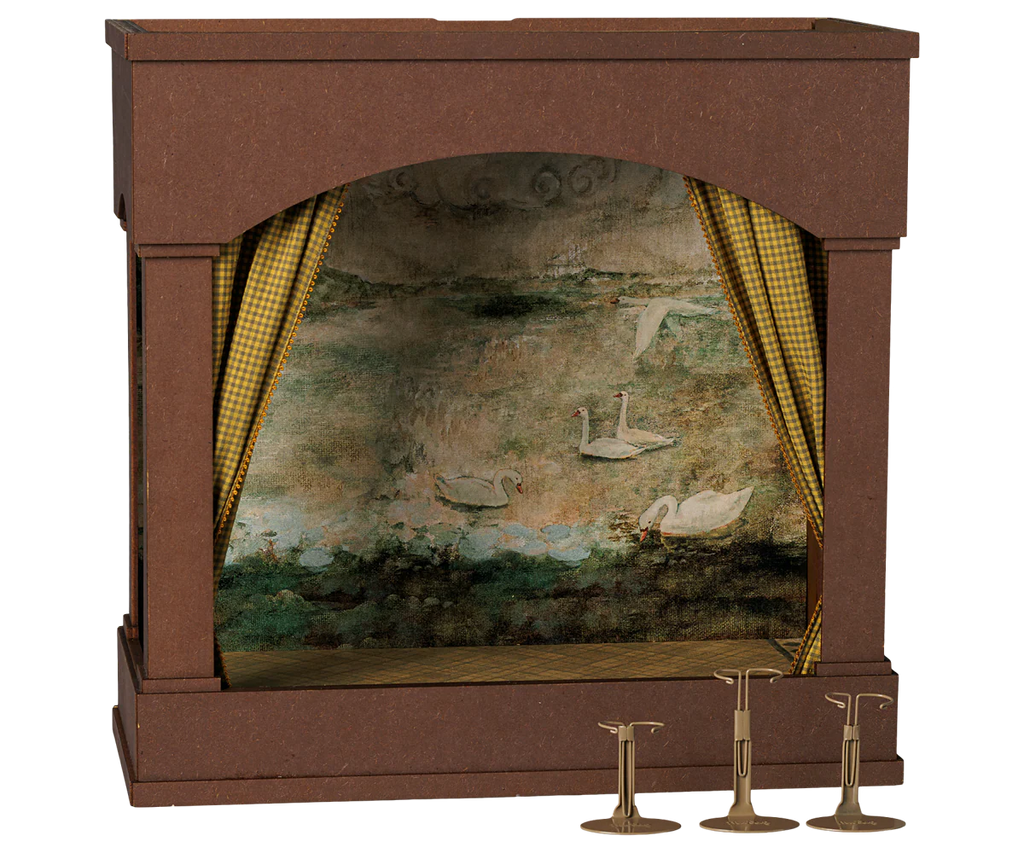 PRE-ORDER: Maileg Theater With Light, Mouse Size (arriving mid-November). This miniature brown wooden theater features yellow checkered curtains, a swan pond backdrop, and three brass candle holders in front of the stage.