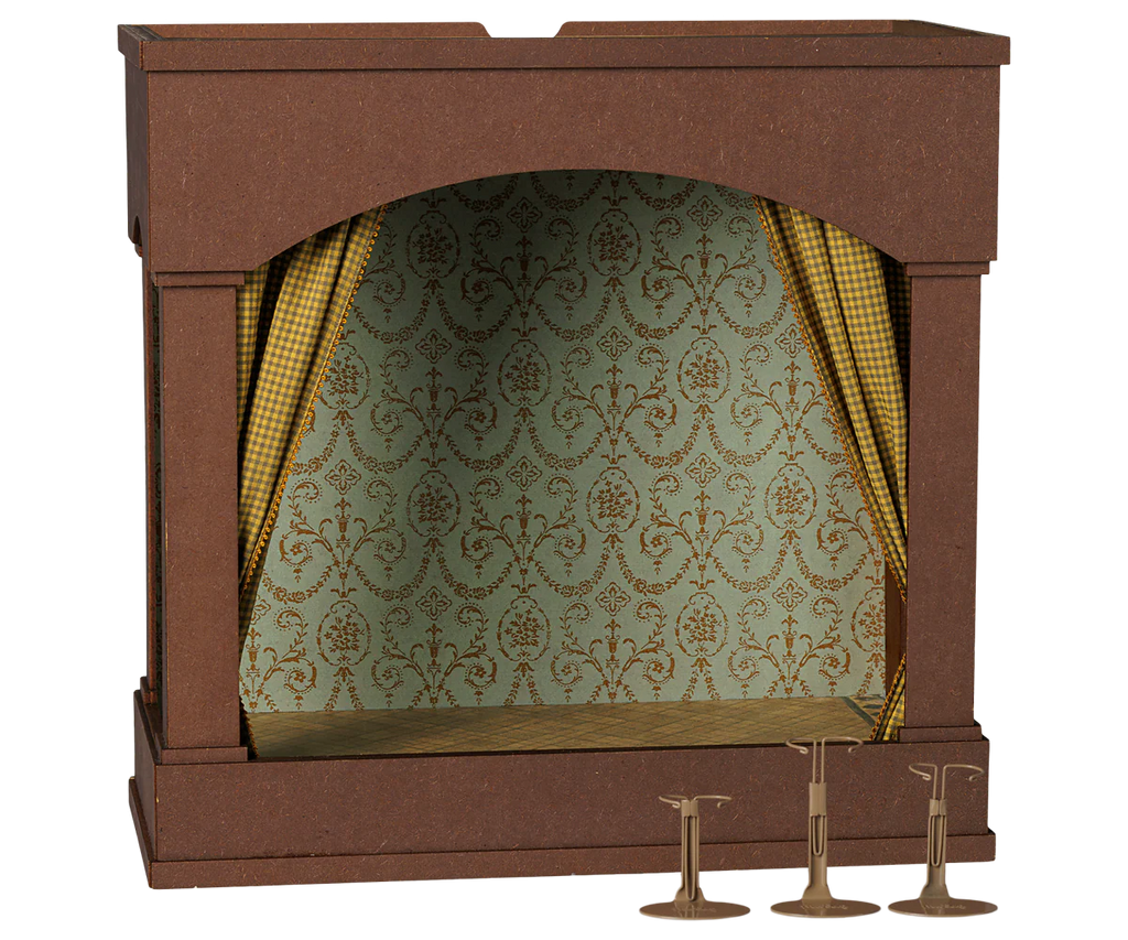 The PRE-ORDER: Maileg Theater With Light, Mouse Size features a miniature wooden design with a green patterned reversible backdrop, yellow checkered curtains, and three small brown microphone stands in front. Estimated arrival: mid-November.