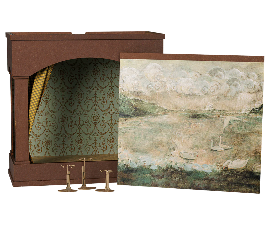 PRE-ORDER: Maileg Theater With Light, Mouse Size (arriving mid-November). Features an ornate backdrop, gold curtain, three small gold stands, and a separate illustrated panel with swans under cloudy skies.