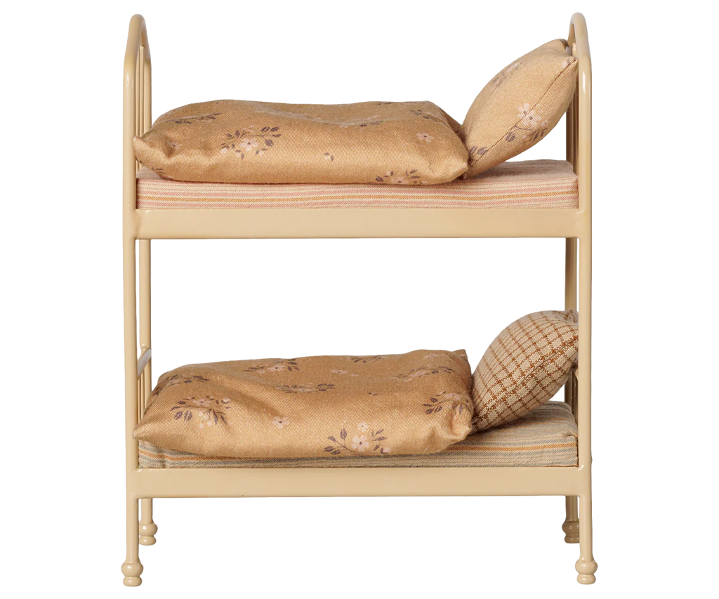 The PRE-ORDER: Maileg Bunk Bed, Mouse - Wheat (Estimated Arrival Mid August) is a small beige bunk bed with floral-patterned bedding—perfect for cozy sleepovers in your Mouse hole Farmhouse, shown against a plain white background.