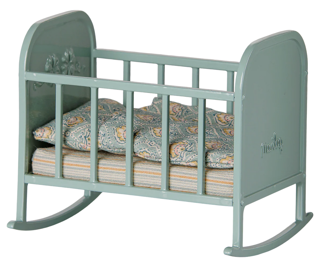 PRE-ORDER: Maileg Cradle, My - Blue Mint (Estimated Arrival Mid August)—a small, blue mint toy cradle with decorative side patterns, includes a patterned mattress and pillow.