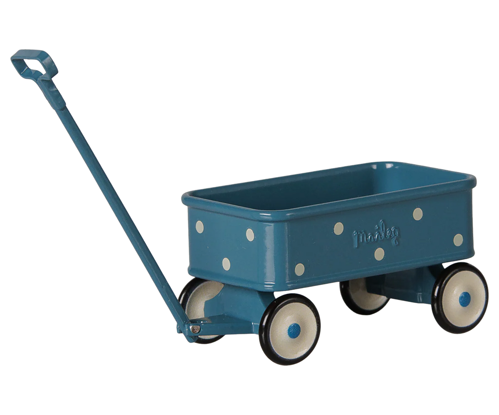 The PRE-ORDER: Maileg Wagon, Mouse - Blue is a small metal toy wagon with white polka dots, four white-rimmed wheels, a long pull handle, and "maileg" embossed on the side—perfect accessories for your mouse family. Estimated arrival mid September.