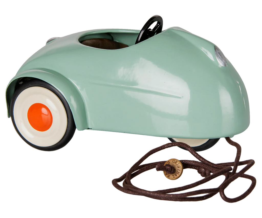 The PRE-ORDER Maileg Car, Mouse - Light Mint (arriving mid-August) is a small, vintage-style mint green pull-along toy car with white and orange wheels, brown pull string, perfect for charming toy mice play.