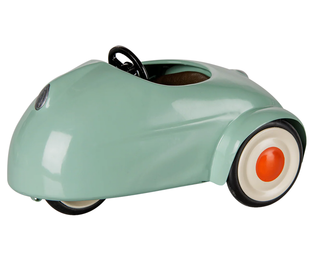 A PRE-ORDER Maileg Car, Mouse in light mint with white wheels and orange centers, plus a black steering wheel, shown from the side on a white background. Estimated arrival: mid August.