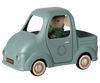 The PRE-ORDER: Maileg Truck, Mouse (Estimated Arrival Early November) is a pale blue toy pickup with gold-and-white wheels and a toy license plate. A stuffed mouse in a green sweater sits in the driver's seat—perfect for imaginative play.