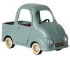 PRE-ORDER: Maileg Truck, Mouse—this small, vintage-style toy car comes in light teal with a black steering wheel, tan interior, white-rimmed wheels, and "DK 56 915" license plate. Perfect for play or the ideal mouse family car. Estimated arrival early November.