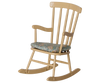 Pre-order the Mouse - Wheat Rocking Chair, arriving mid-August, featuring a light brown wood finish, vertical slat backrest, and soft cushion seat—perfect for cozy Mouse hole Farmhouse charm in any room.