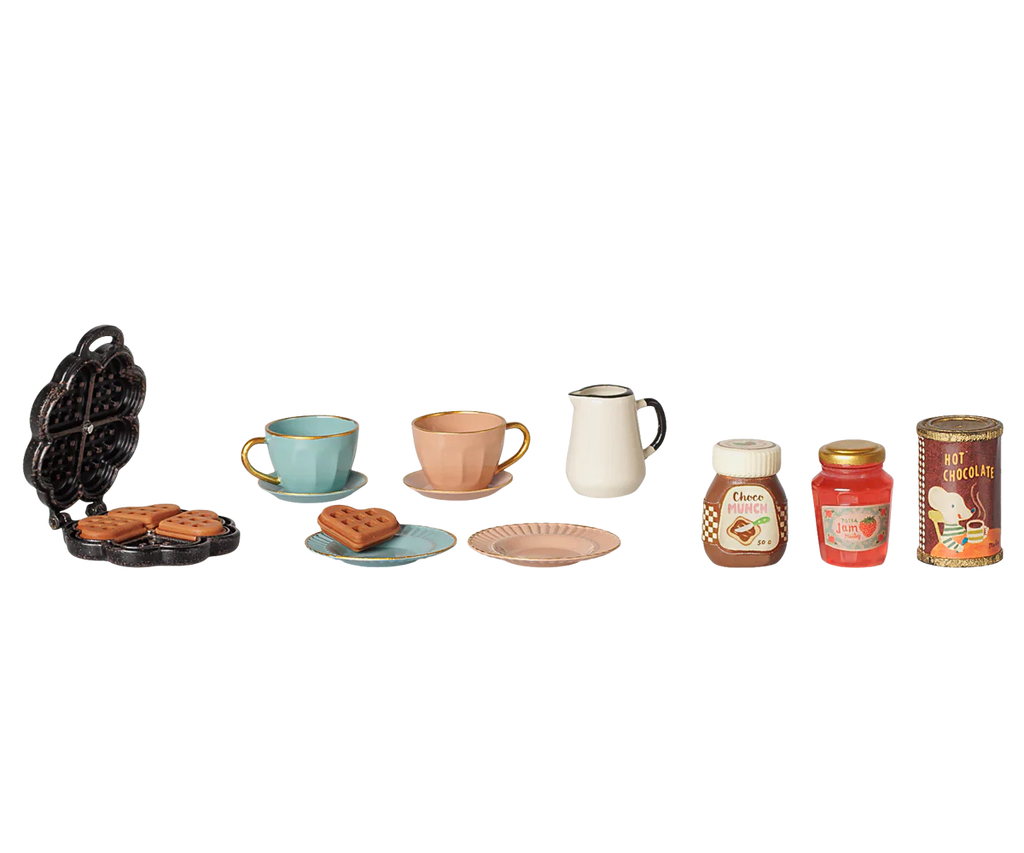 The PRE-ORDER: Maileg Waffle Set, Mouse (Estimated Arrival Mid October) features heart-shaped waffles, teacups with saucers, plates, a milk jug, and jars for choco spread, strawberry jam, and hot chocolate—ideal for imaginative play breakfasts!.