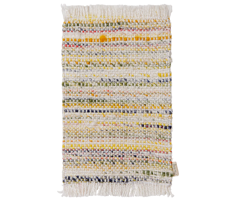 The PRE-ORDER: Maileg Rug, Mouse, Small - Multi Stripe features a rectangular white base with yellow, blue, green, and orange stripes. It includes fringed short edges and a small tag; ideal for the living room. Estimated arrival: Mid September.