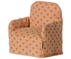 The PRE-ORDER: Maileg Folding Chair, Mouse - Dots (arriving mid September) features fun orange polka dots—ideal as dollhouse furniture or for your Mouse hole Farmhouse.