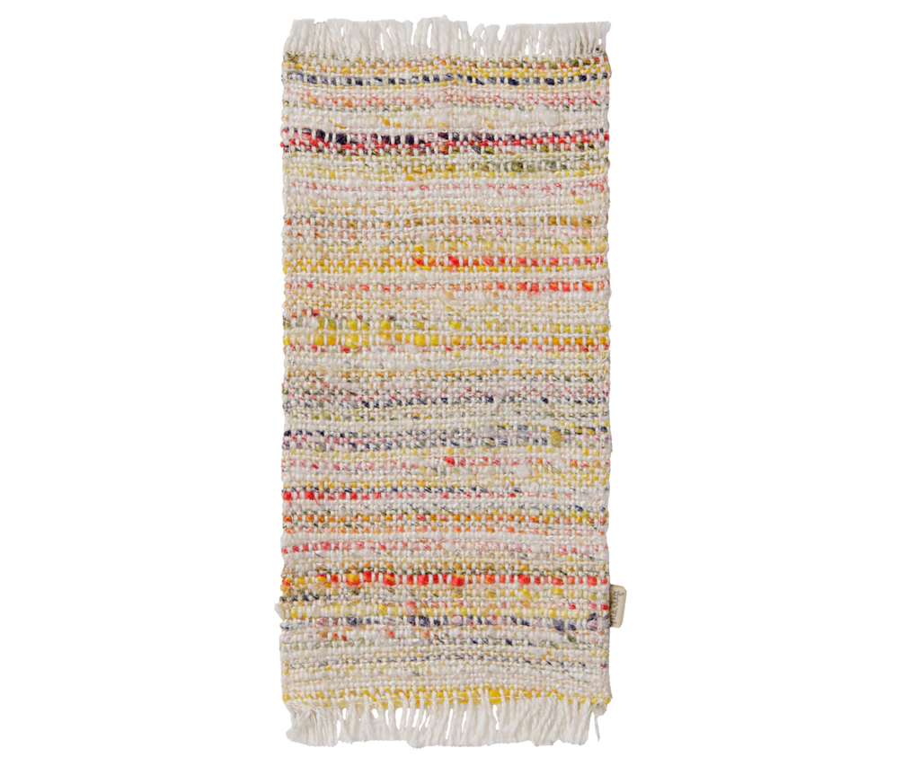The PRE-ORDER: Maileg Rug, Miniature, Medium - Multi Stripe (Estimated Arrival Mid September) is a rectangular woven rug with a textured pattern in light, yellow, orange, and red stripes and white fringe on both short ends—perfect for a living room.