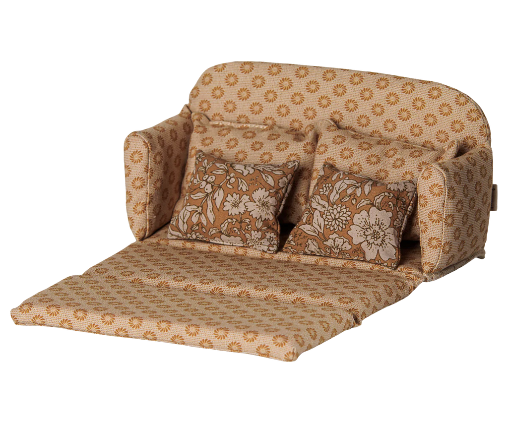 PRE-ORDER: Maileg Sofa Bed, Mouse, Large - Ocher. A miniature toy sofa bed with a yellow and orange floral pattern, two matching pillows, and an extended section—perfect for mice. Estimated arrival: early October.