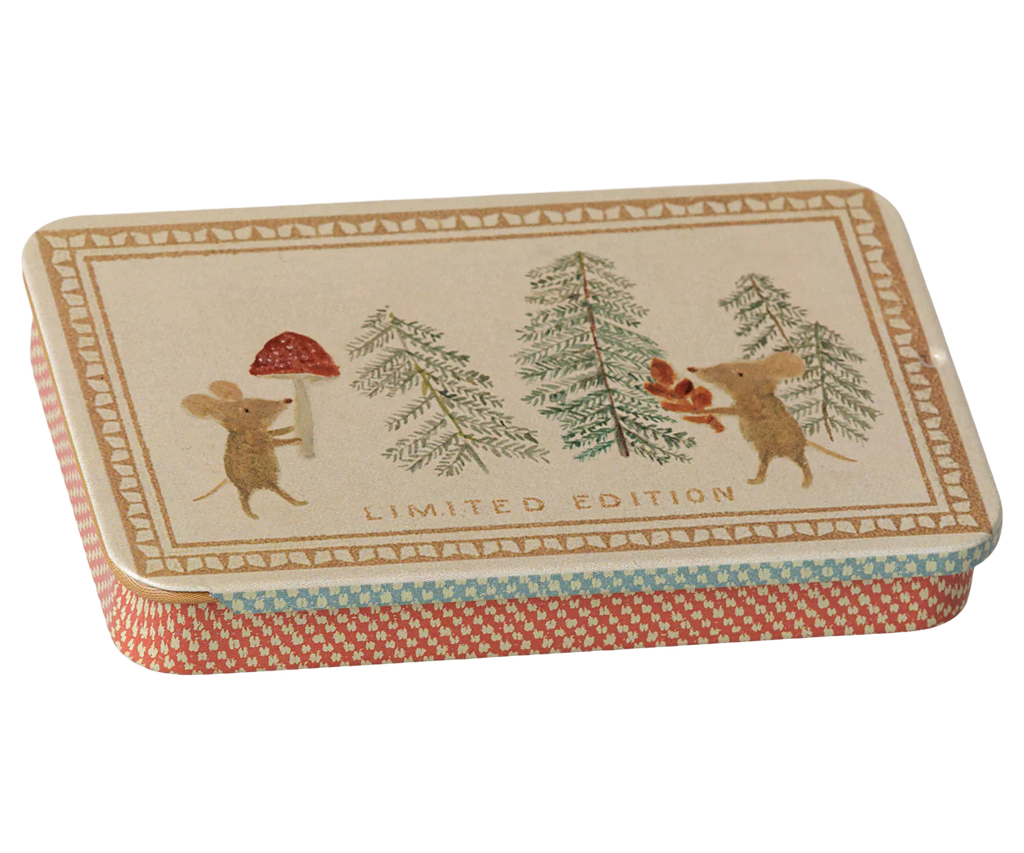 PRE-ORDER: Maileg Metal Box with Sliding Lid - Christmas Mice. Features two mice among pine trees, one with a mushroom, one with leaves. "LIMITED EDITION" on lid. Sides have a red and white woven pattern; ideal as a gift card box. Arrives early October.