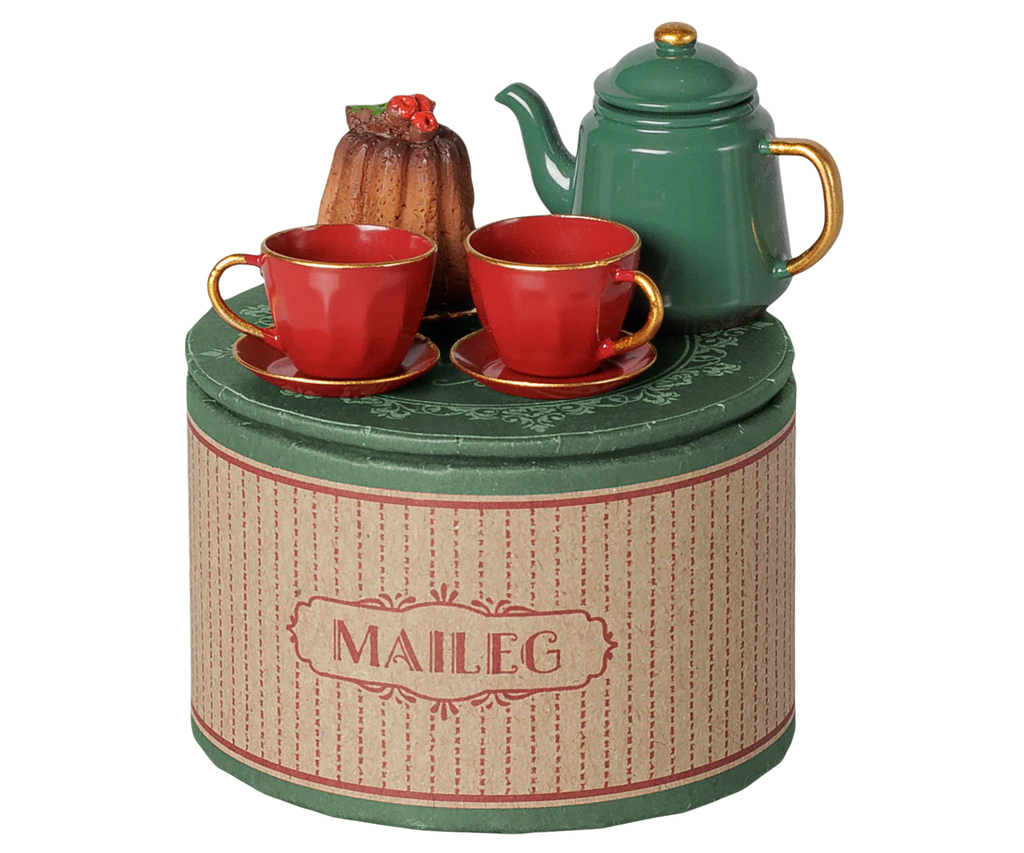 The PRE-ORDER: Maileg Christmas Tea Party, Mouse - Red/Green set features a green teapot, two red teacups with saucers, and a cake on a round "Maileg" box—perfect for holiday tea parties. Estimated arrival early November.