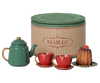 PRE-ORDER: Maileg Christmas Tea Party, Mouse - Red/Green is a festive set with a green teapot, two red cups with saucers, a small cake, and a striped round box—ideal for a mouse family tea set or charming Christmas display. Arrives early November.